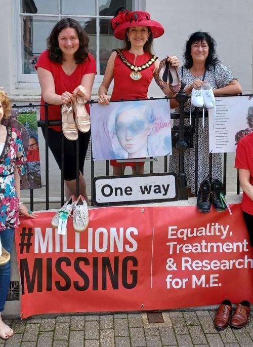 Colour photograph of a group of members of the ME/CFS group outside of St Albans Museum and Gallery