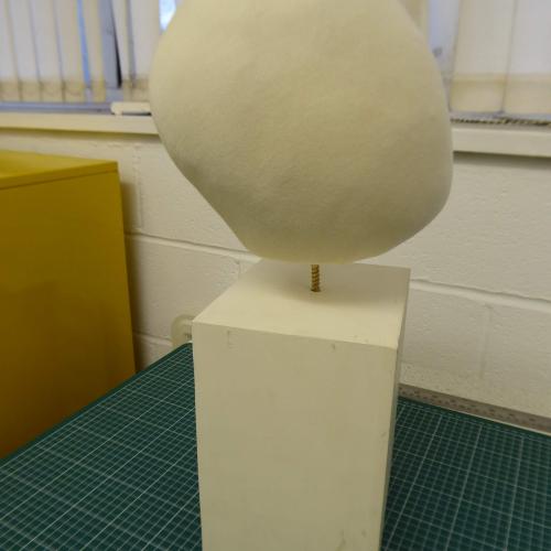 Photo of the finished and mounted white mannequin head