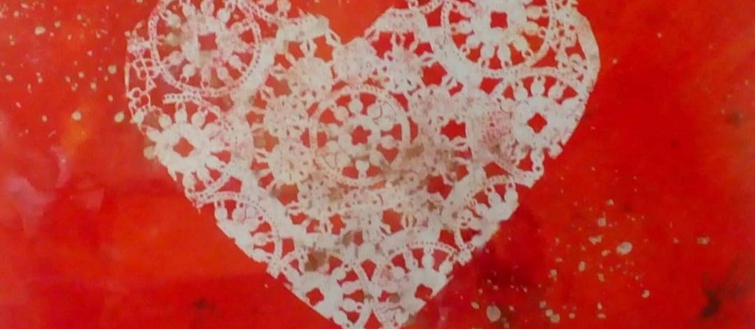 print in orange ink using a doily to create a heart shaped pattern by Suman Gujral