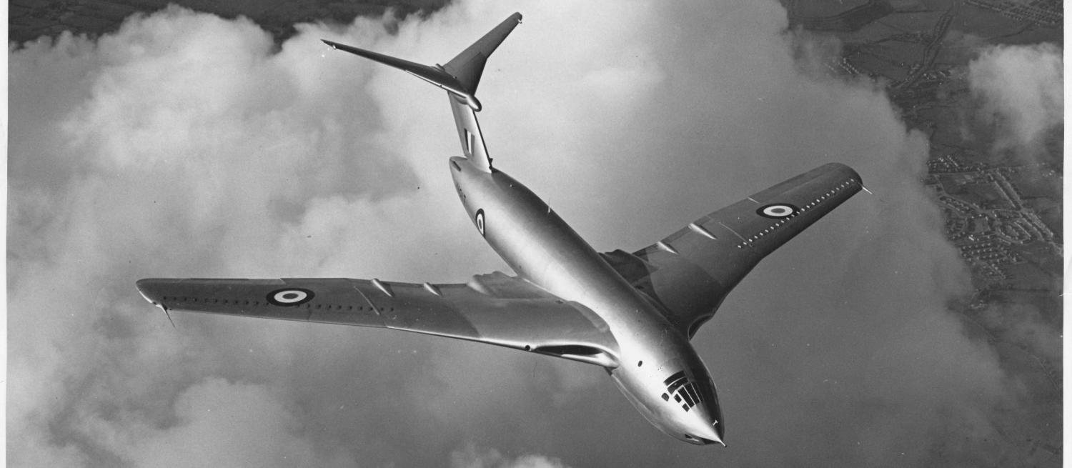 B&W photograph of Victor Aircraft flying over the clouds