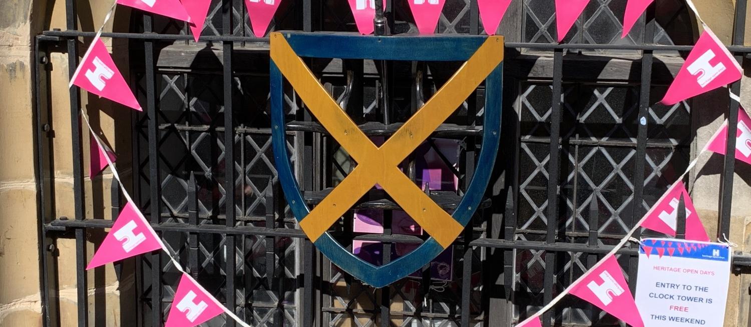 Heritage Open Day bunting around the window of the Clock Tower