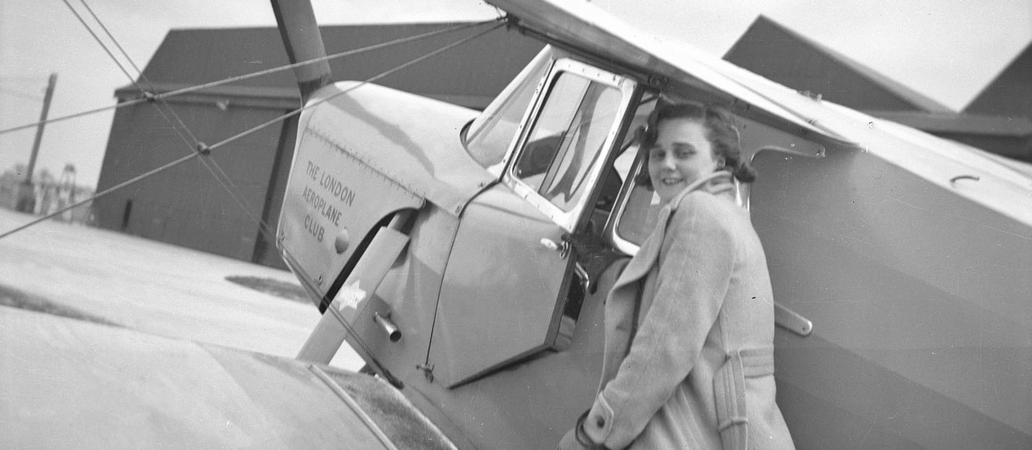Joan Hughes with a de Havilland Hornet Moth
