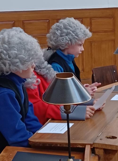 Children dressed as magistrates in Victorian England