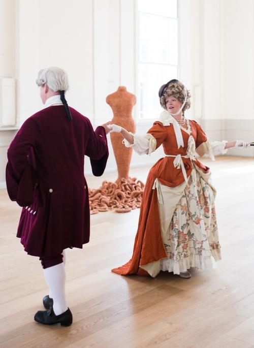 A couple dancing in Georgian costume in the Assembly Room